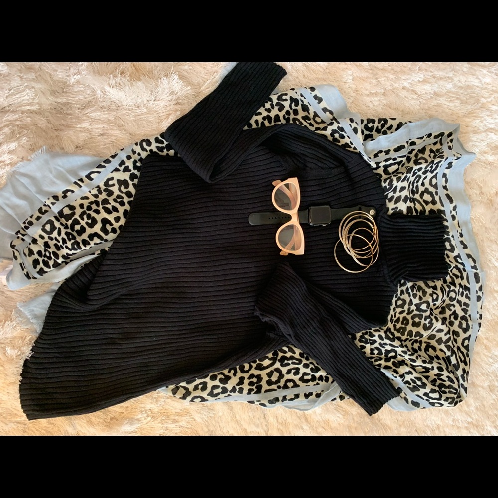 Chico’s ribbed, black turtleneck sweater. Size 2 (12-14 L). Like new.